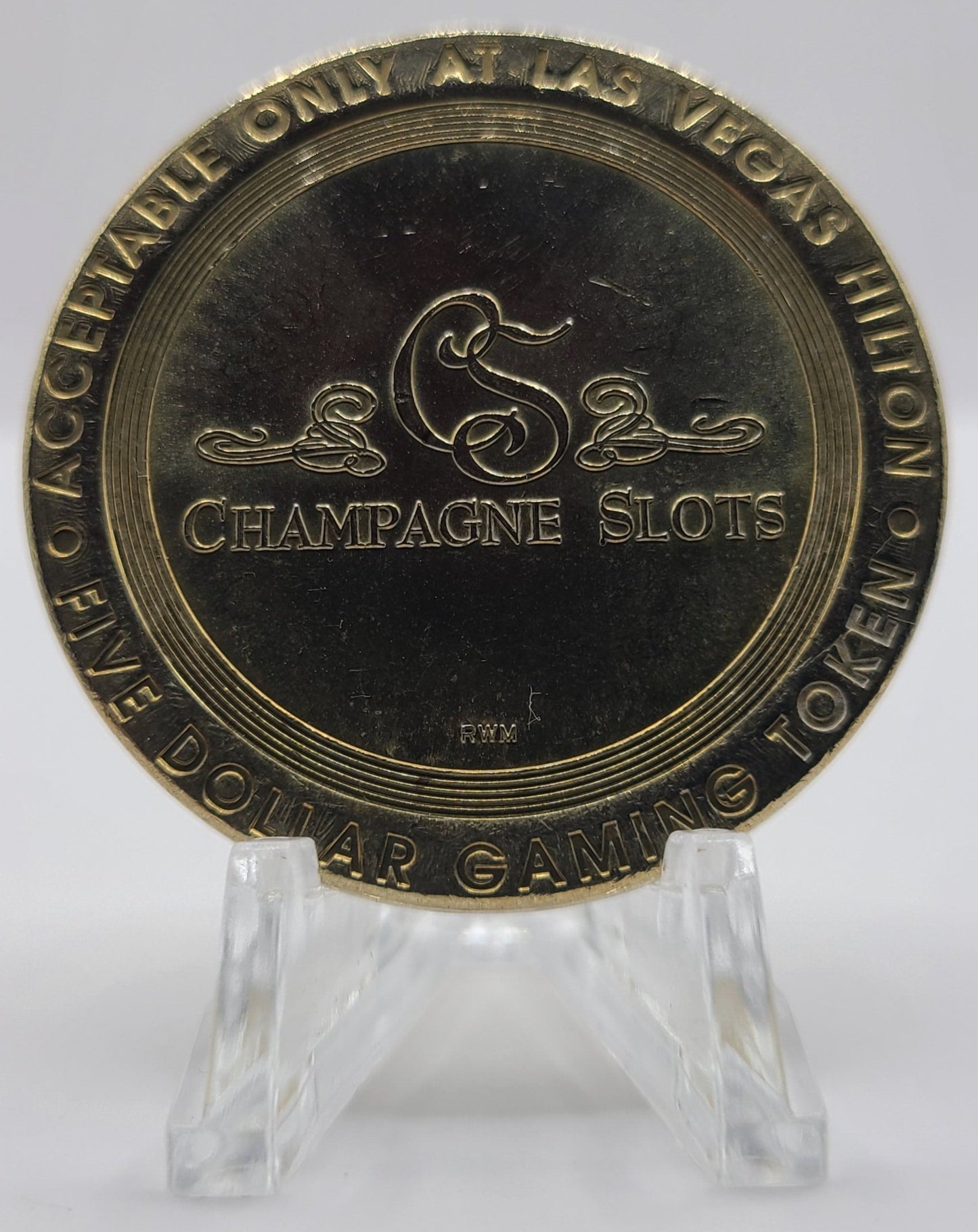 Hilton Casino Las Vegas NV “Champagne Slots” 1999 $5 Gaming Token