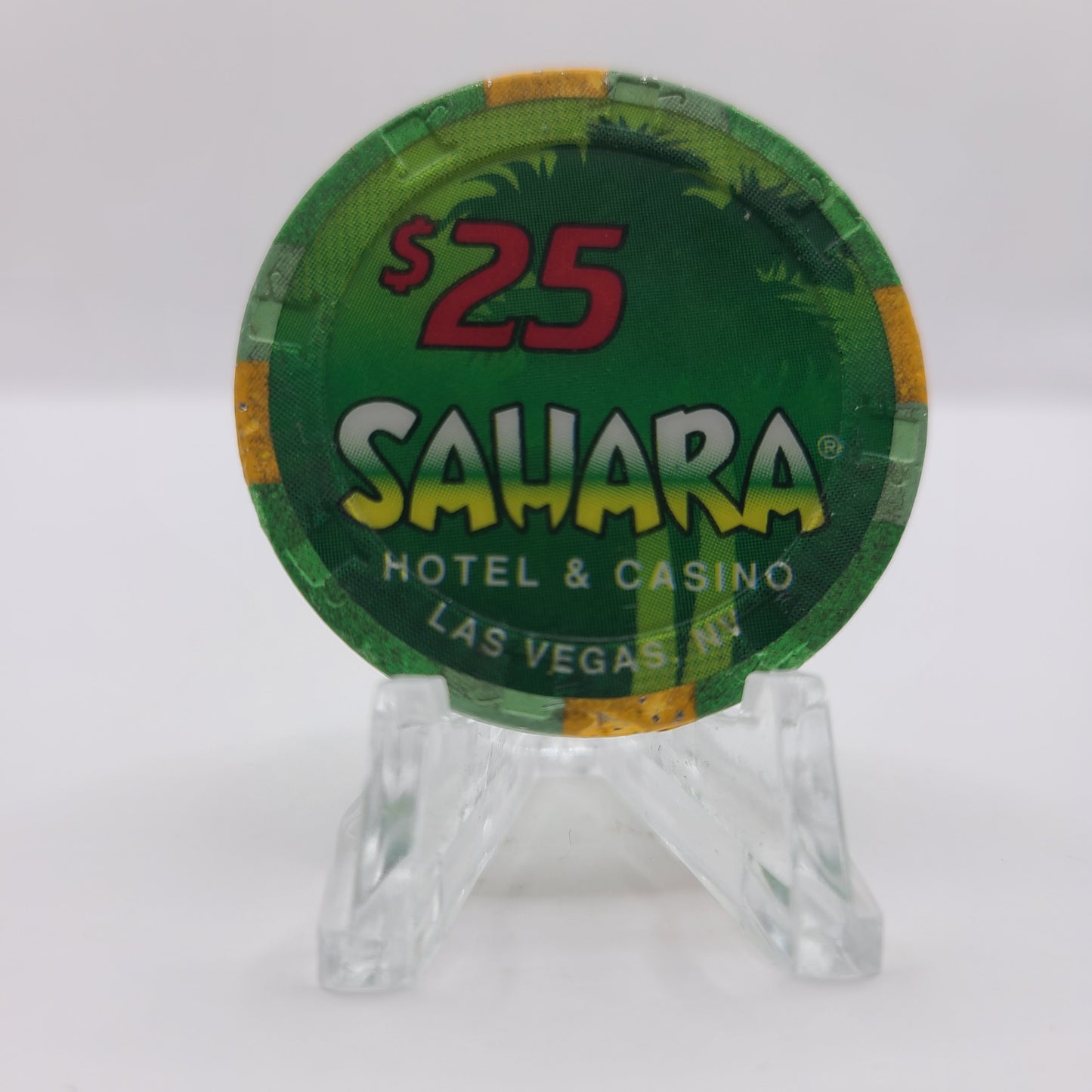 Sahara Hotel Casino Las Vegas Nevada 1995 $25 Chip N2661 (small chip in one the yellow inserts)