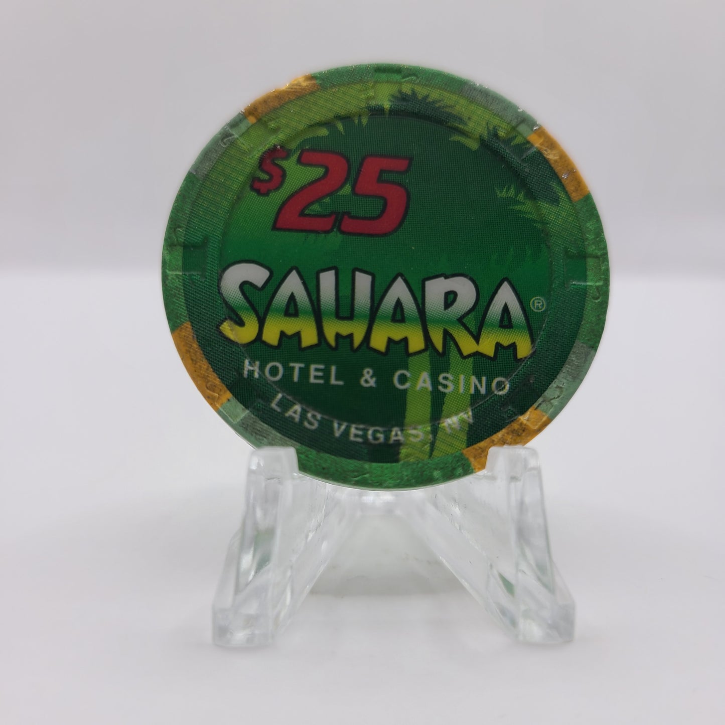 Sahara Hotel Casino Las Vegas Nevada 1995 $25 Chip N2661 (small chip in one the yellow inserts)